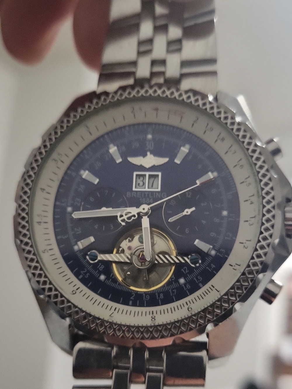 Breitling Silver Watch with Blue Dial and Open Heart